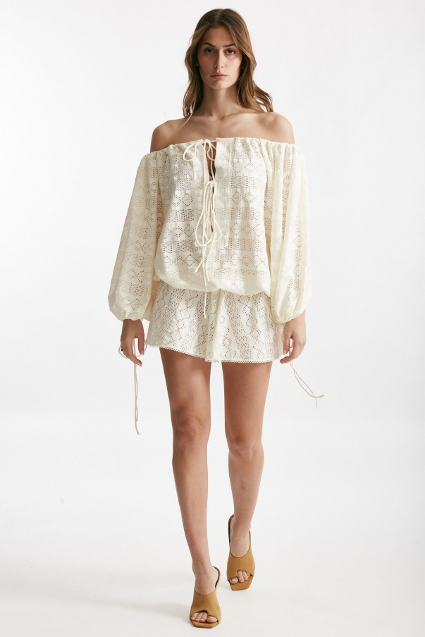 Jumpsuit scollata in sangallo panna 