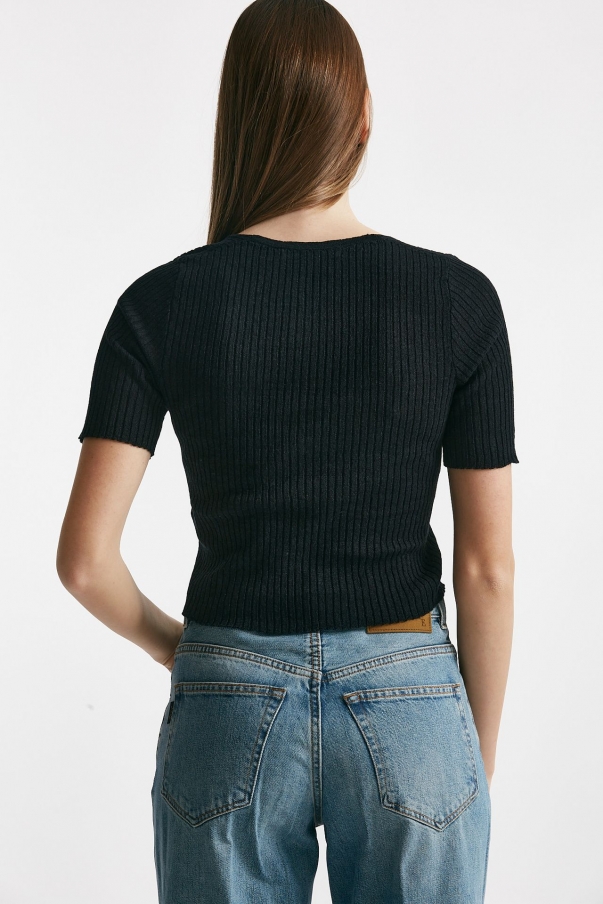 Maglia a costine nero scollo a v