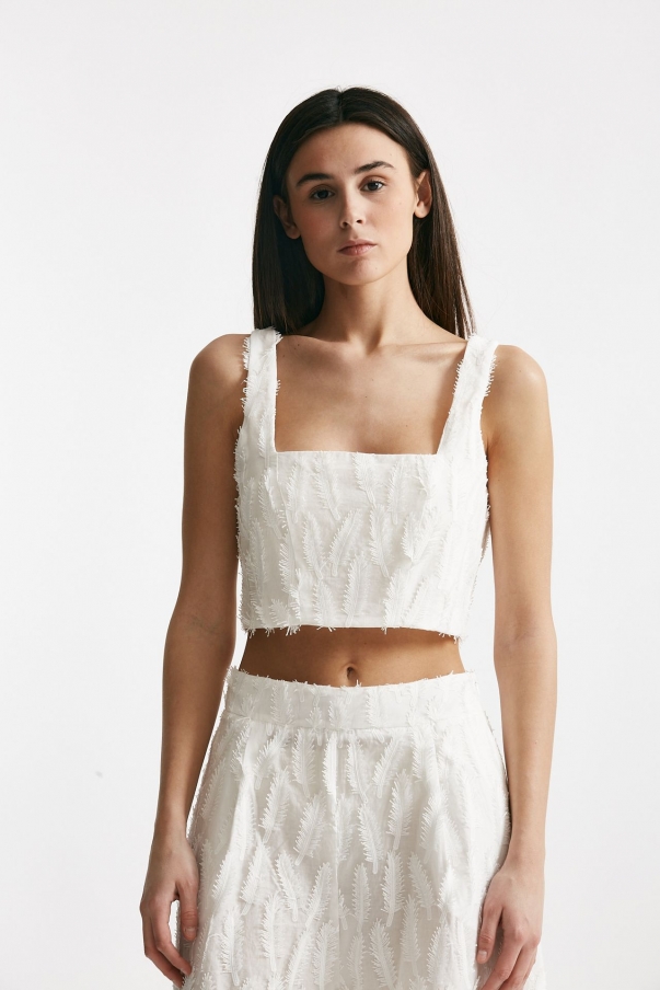 Top crop con applicazioni bianco