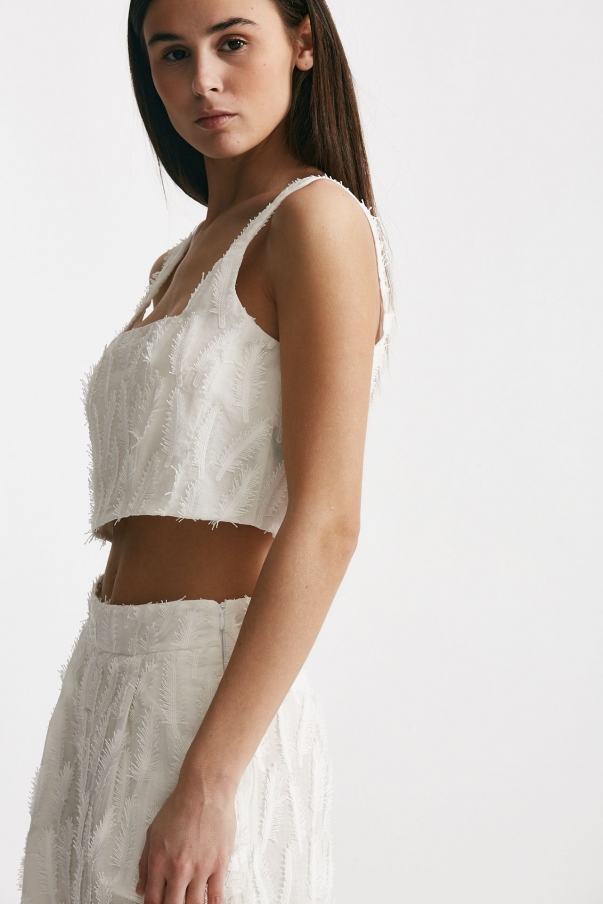 Top crop con applicazioni bianco