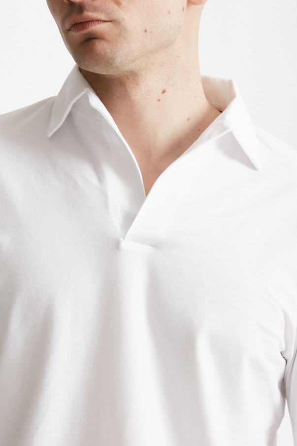Polo in cotone stretch scollo V bianco
