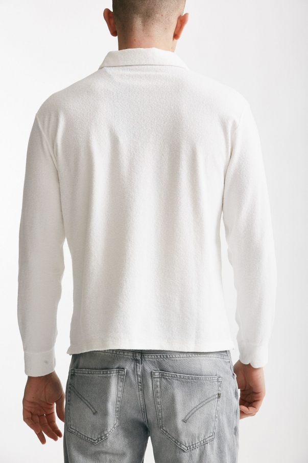 Polo in cotone scollo V bianco 