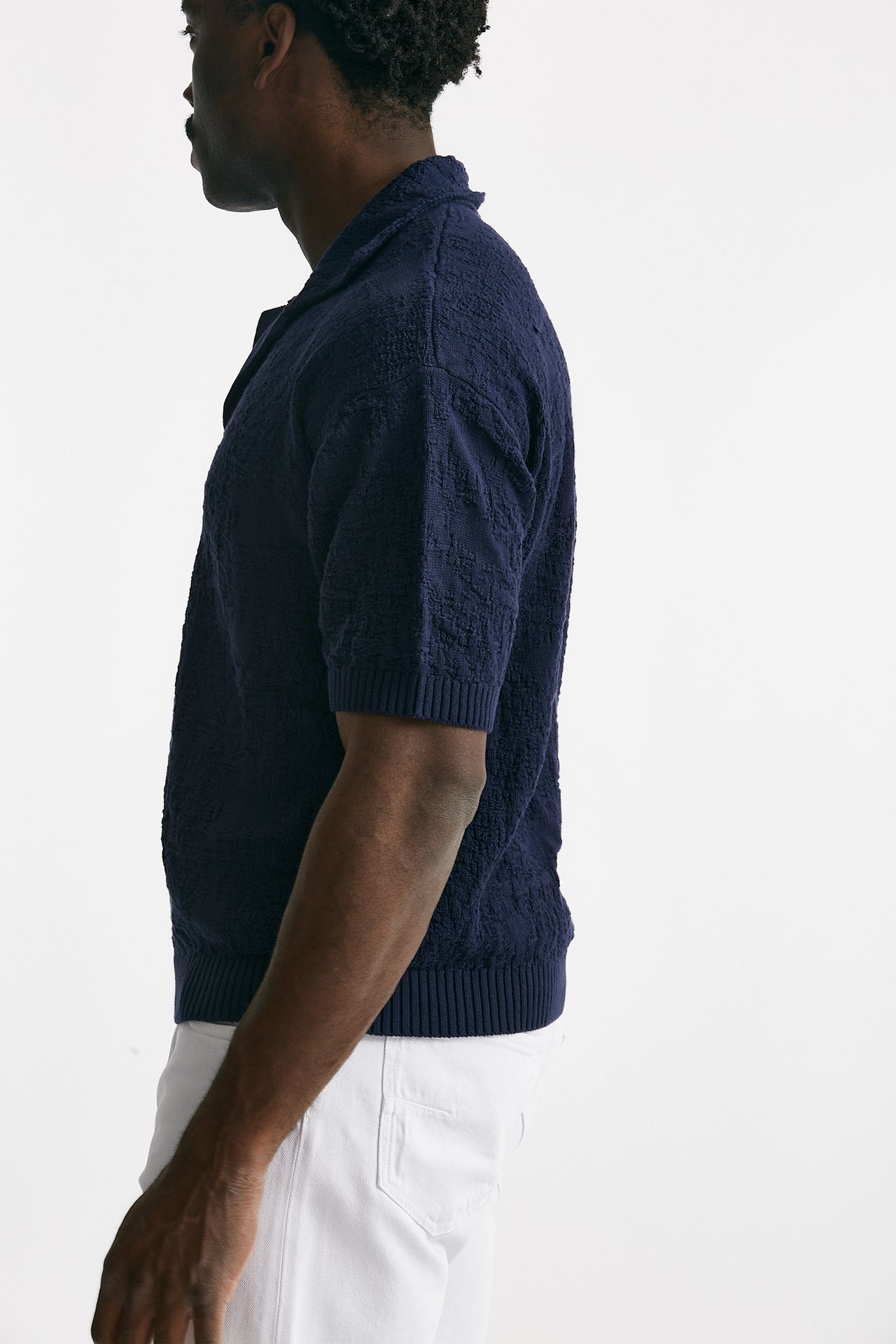 Polo lavorata in cotone blu