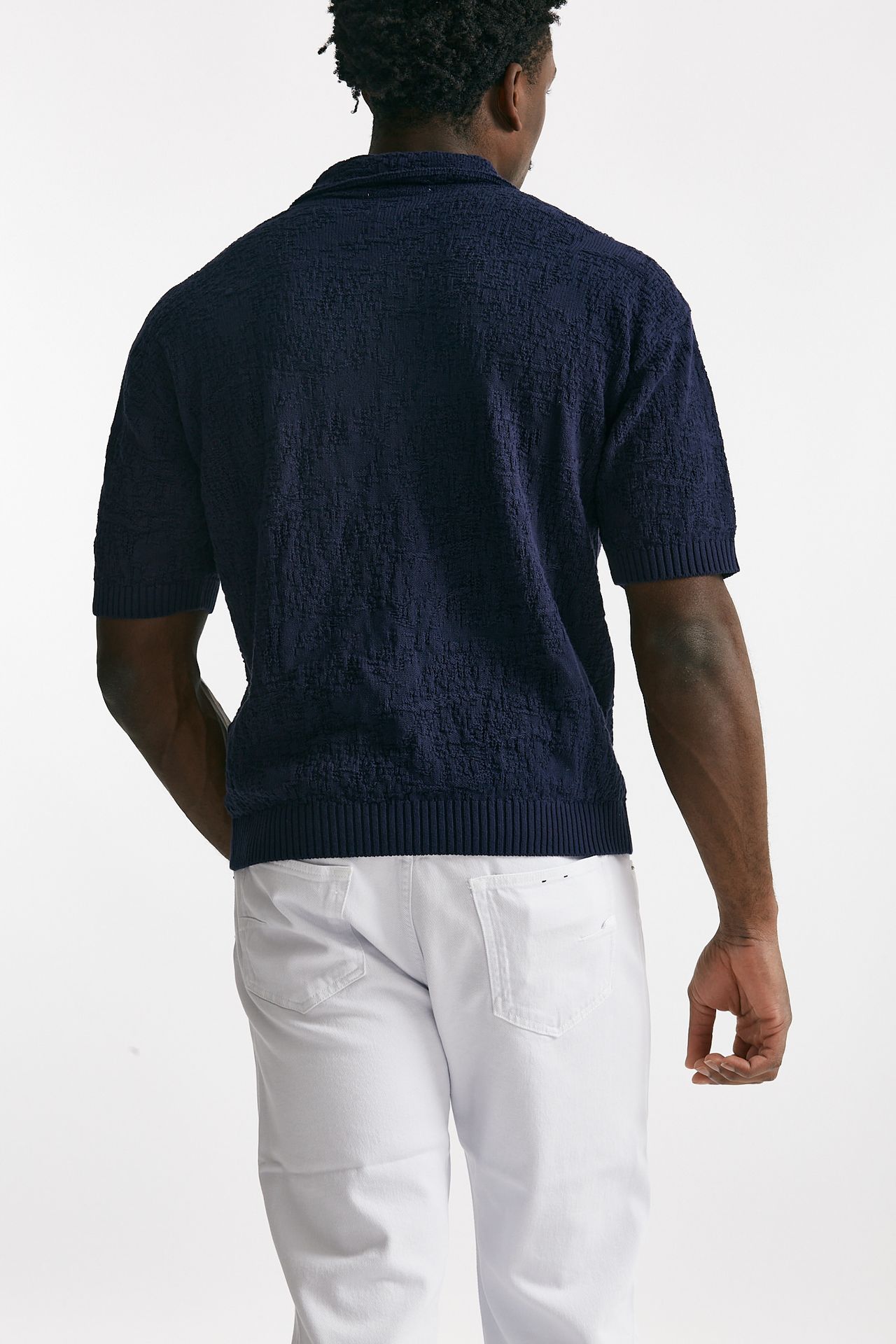 Polo lavorata in cotone blu
