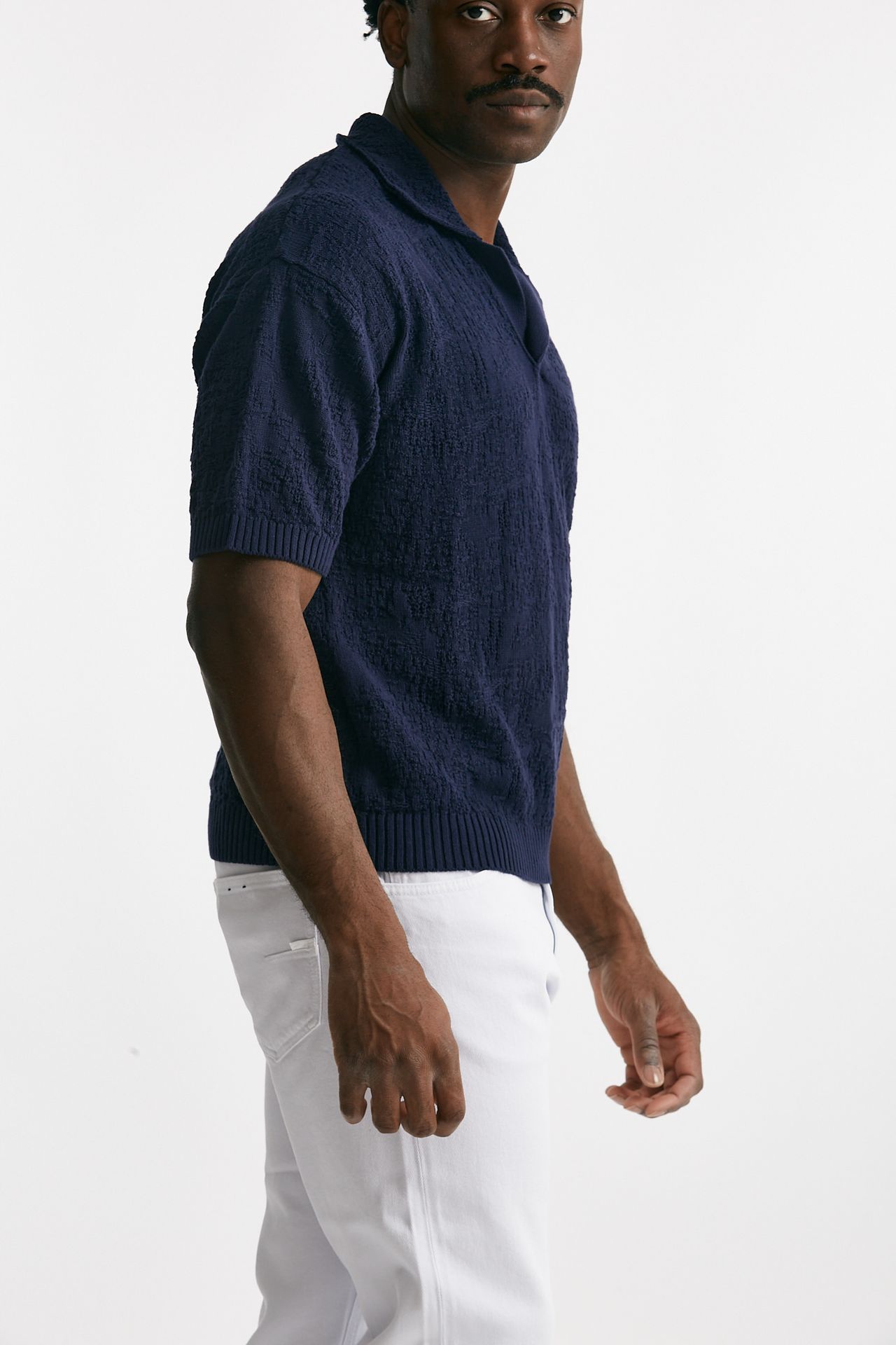 Polo lavorata in cotone blu