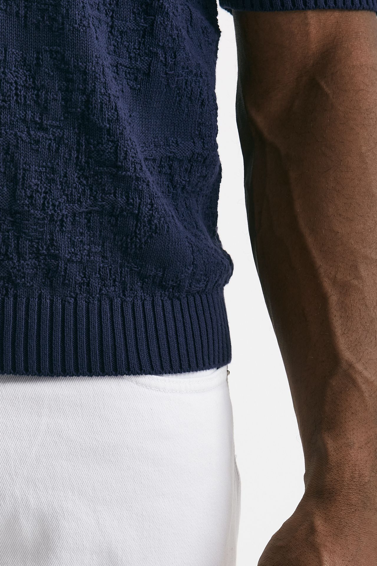 Polo lavorata in cotone blu
