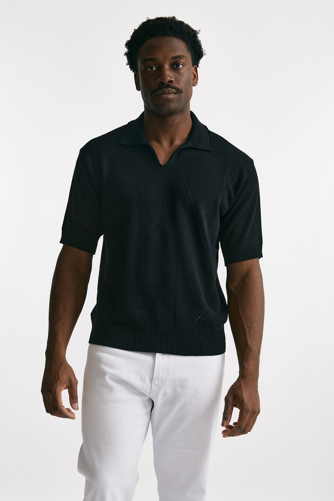 Polo in cotone traforata nero