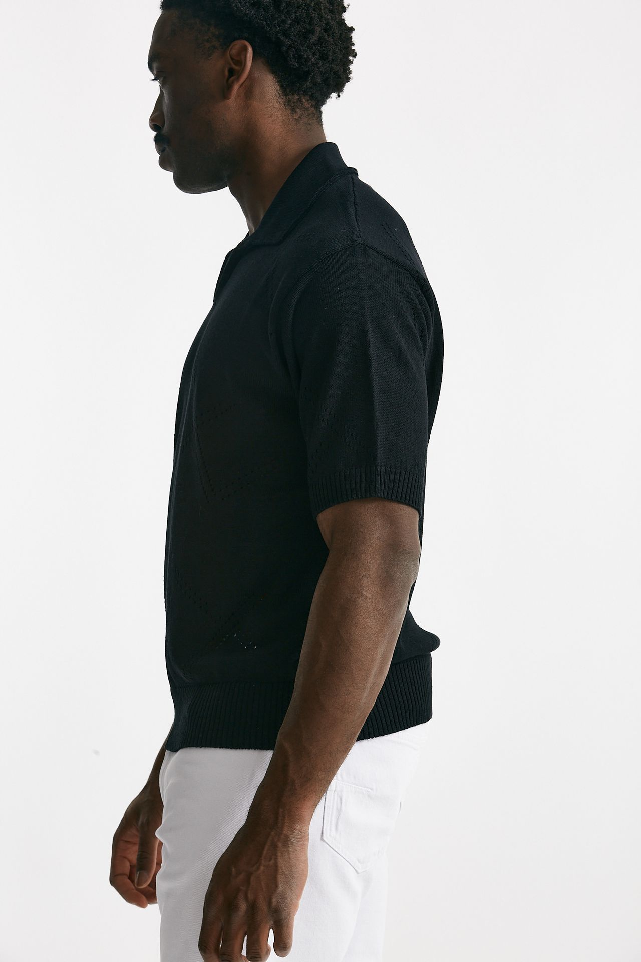 Polo in cotone traforata nero