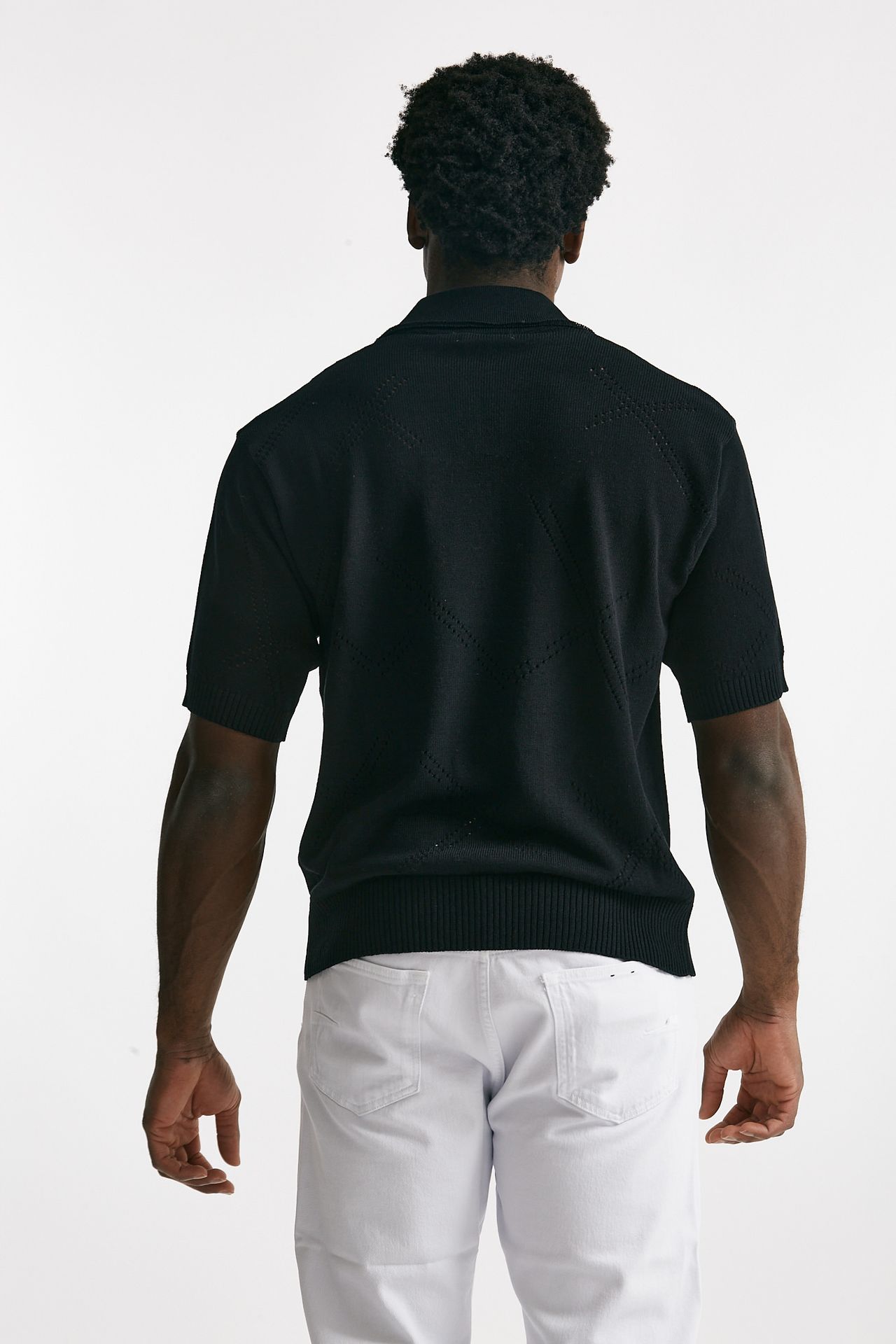 Polo in cotone traforata nero