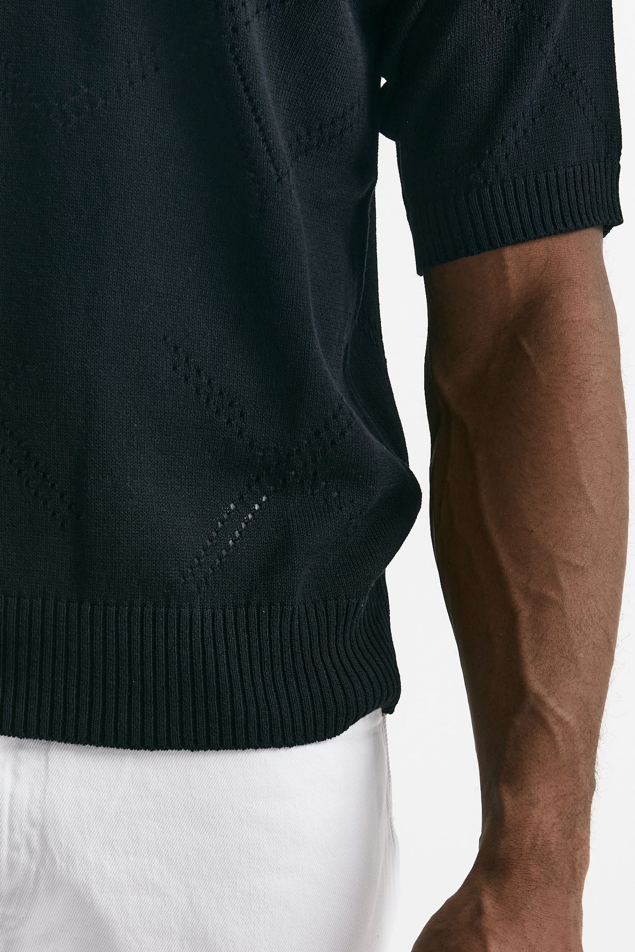 Polo in cotone traforata nero