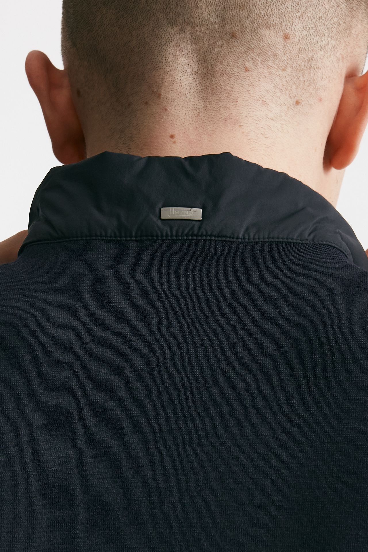 Smanicato in micro piuma e jersey di cotone blu