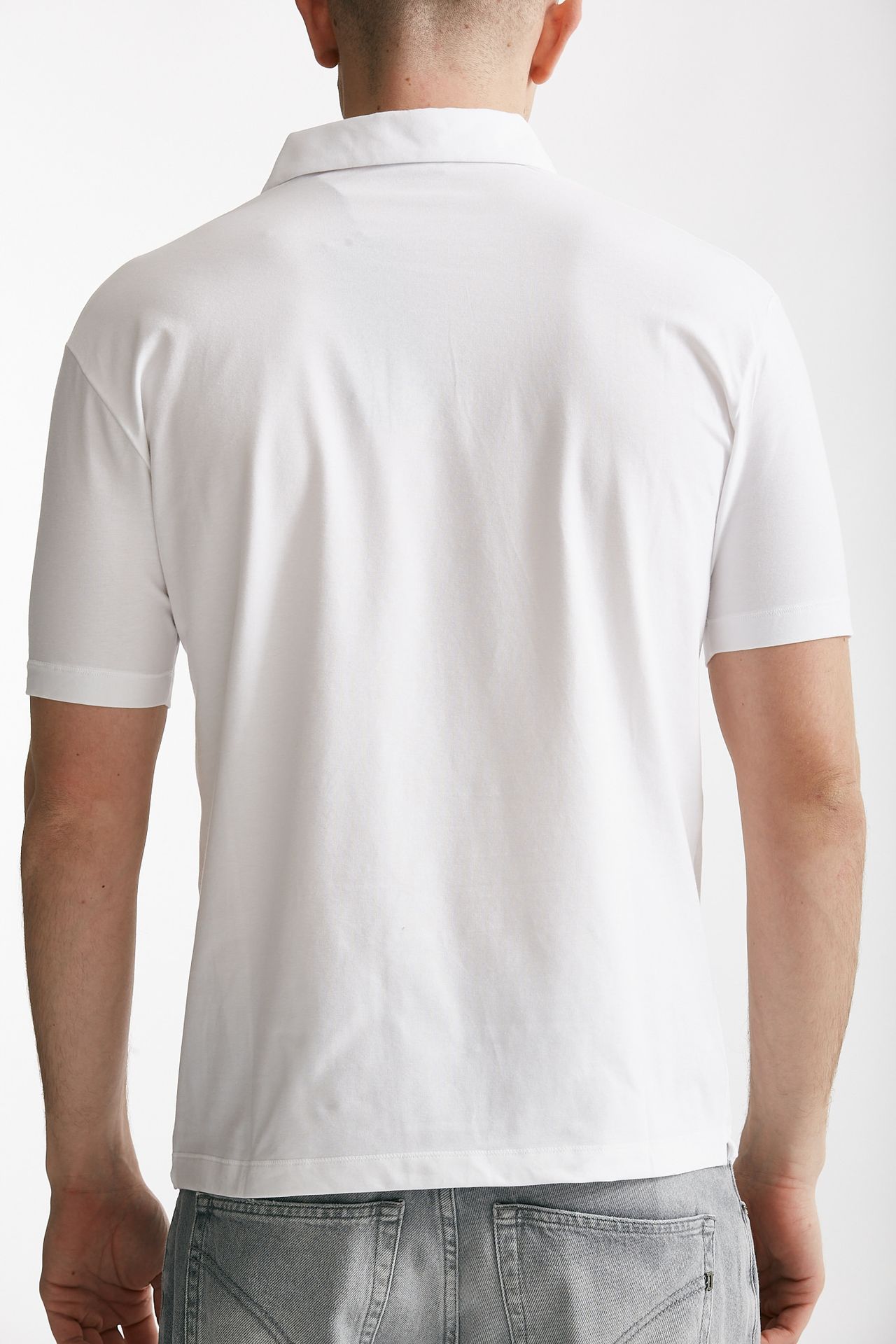 Polo in cotone stretch scollo V bianco